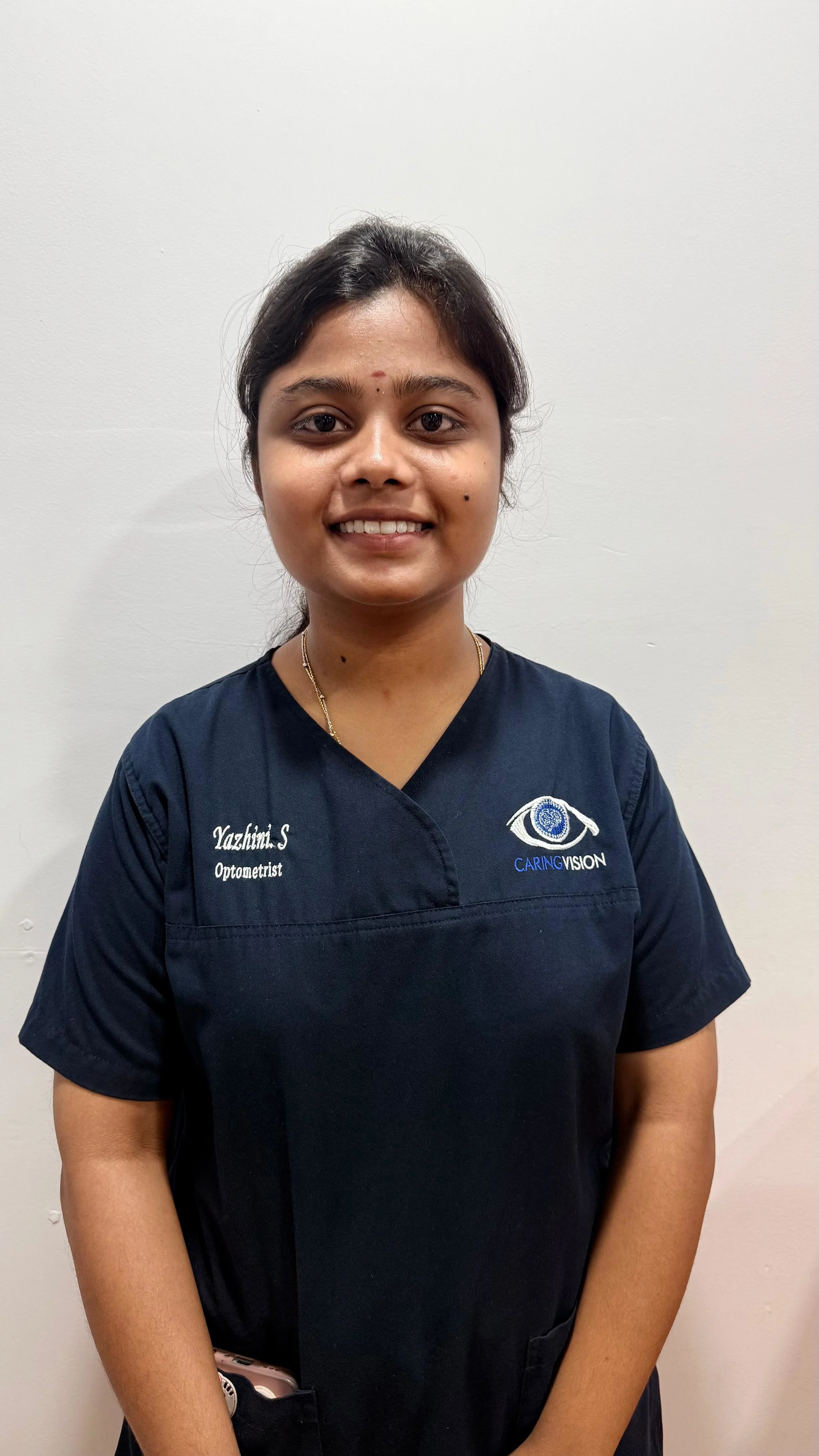 Optometrist Yazhini S at Caring Vision Therapy